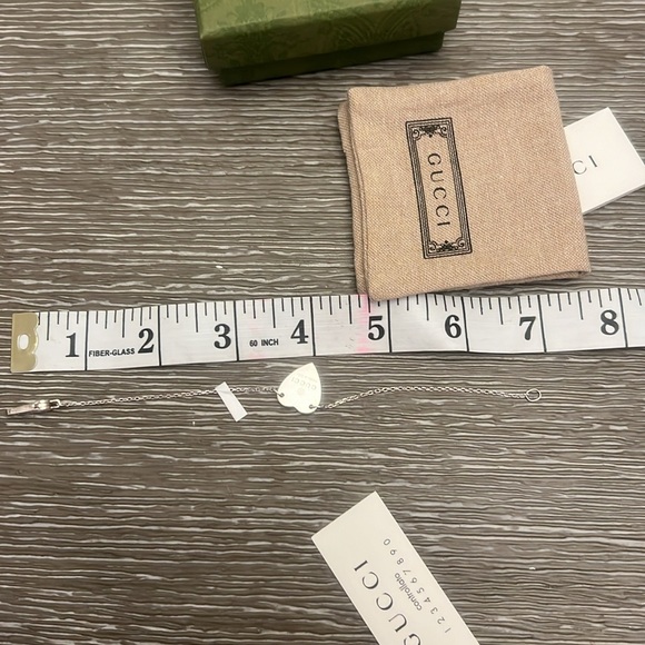 GUCCI TRADEMARK BRACELET WITH HEART PENDANT - Picture 7 of 7